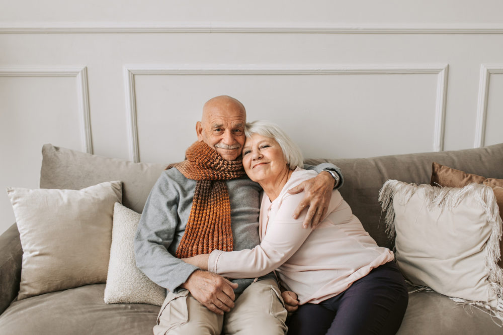 A mature couple hugging