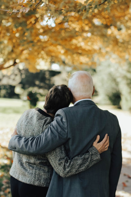 A mature couple hugging